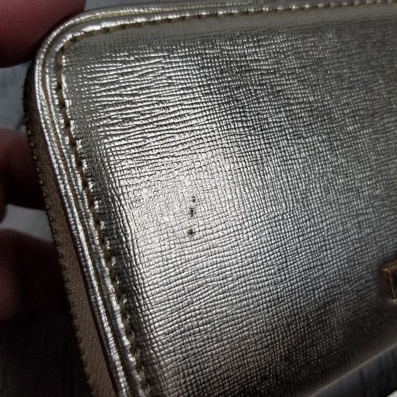 ALDO | metallic gold zip close wrist strap wallet - Picture 3 of 6